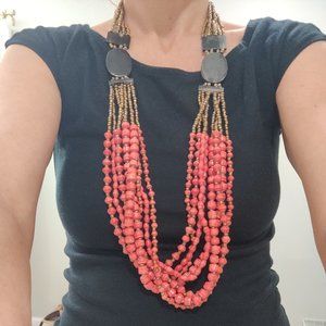 Beautiful Noonday coral colored paper bead necklace